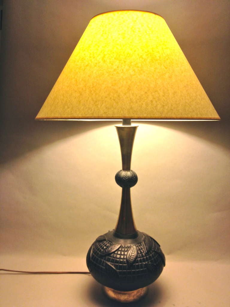Globe Form Pottery and Brass Lamps