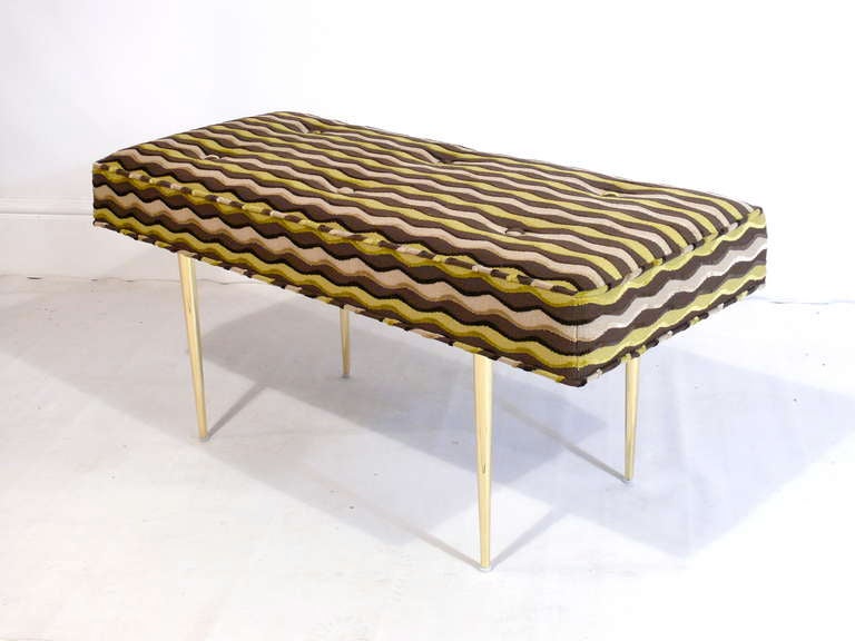 Custom mid century inspired pair of Gio benches designed by Irwin Feld Design for CF Modern. Benches as shown are covered in a wavy cut chenille and supported by four very slender solid brass legs. Available in custom sizes and COM.  Legs available