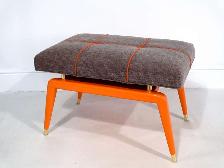 This pair of elegantly appointed custom Formation benches are designed by Irwin Feld Design for CF Modern.  Boasting clean and sculptural lines, the solid maple bases are lacquered in Hermes orange and have custom brass sabots, risers and finials.  