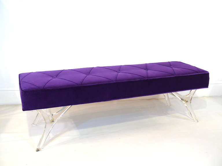 Presenting our infamous Finn leg bench, now in Lucite by Irwin Feld Design for CF Modern. Hand-sculpted out of Lucite, the Finn leg bench has an interior stretcher with chrome or brass sabots. Shown here with a diamond-stitched and buttoned top in