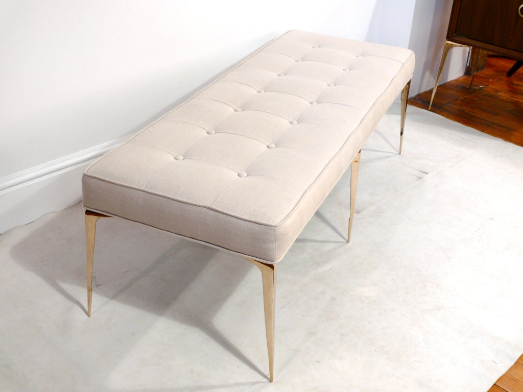 The Signature Stiletto Bench, designed by Irwin Feld for CF MODERN, features a quadrant seamed top with button details that stands on six polished brass Signature Stiletto Bench.

CF MODERN merchandise is available in custom sizes, wood and hardware