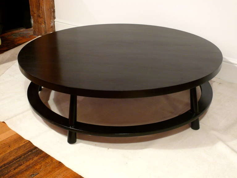 Designed by Irwin Feld Design for CF Modern, this stunning coffee table with five tapered legs and floating ring base was inspired by the work of TH Robsjohn Gibbings.  Shown with a 48