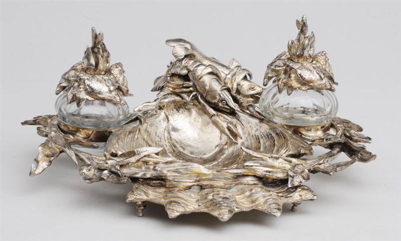 The scalloped shell-form dish flanked by aquatic branches and a fish and lobster handle, fitted with two glass wells with mollusk and cattail covers. (total 5 pieces)