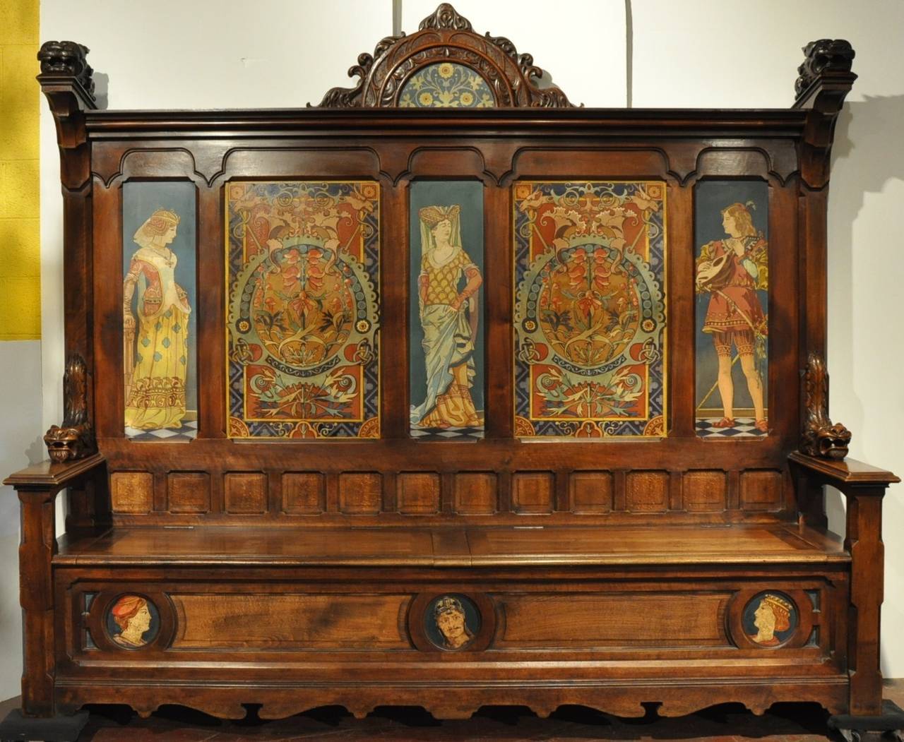 Exceptional and massive 19th century walnut bench with 9 hand painted porcelain plaques. This bench is signed in the back 