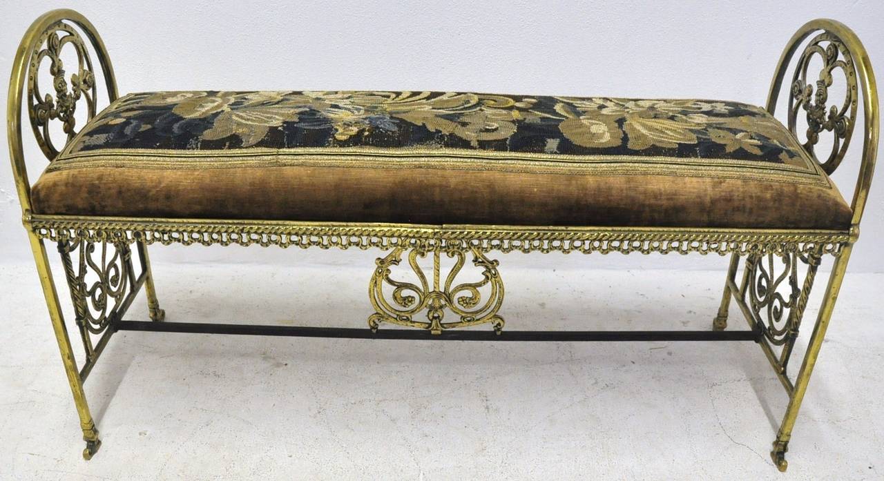 19th century brass bench covered with 18th century Aubusson tapestry with antique gold trim around (circa 1860).