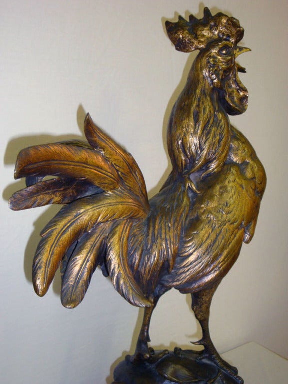 Very elegant and tall 19th century bronze rooster signed “Comolera” with “Societe des bronzes de Paris” stamp, circa 1870.
 Paul Comolera (1818-1897) was a French animal sculptor, specializing in roosters. A student of Francois Rude, Comolera's