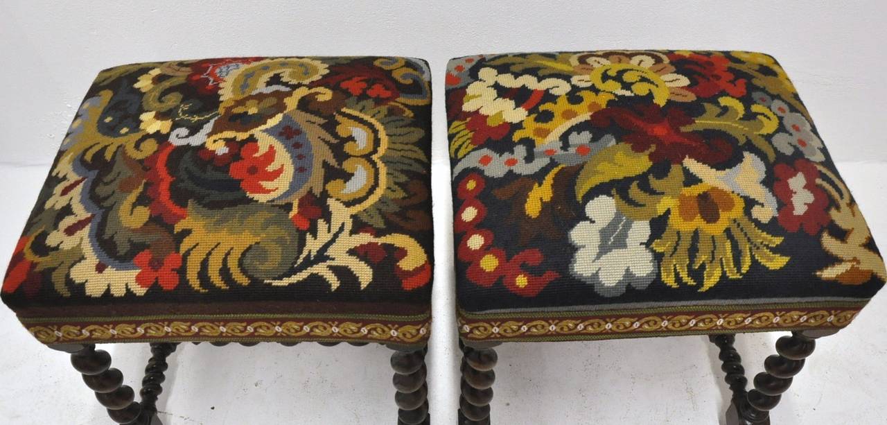 Nice pair of 19th century walnut barley twist stools with original needlepoint tapestry (circa 1870).