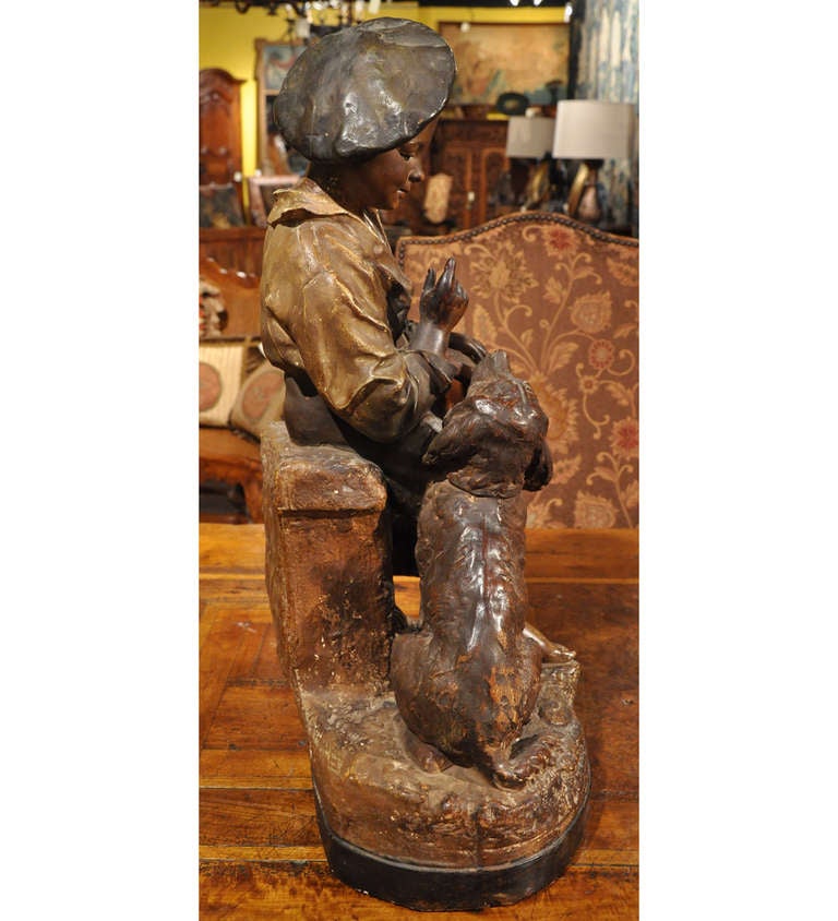 This whimsical turn-of-the-century Terracotta Statue by Joseph Guluche( French; 1849-1915) is titled 