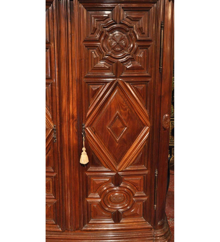 Louis XIII 18th Century French Carved Walnut Bow-Front Armoire from the Perigord