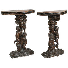 Pair of 19th C. Carved Italian Walnut consoles