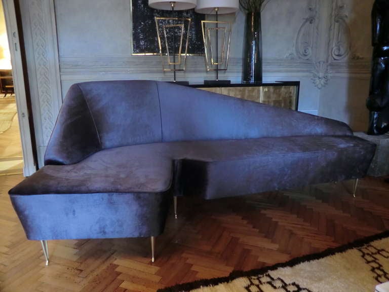 Original vintage structure newly reupholstered in grey velvet brass feet.