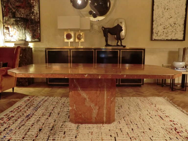 Rosso Alicante marble table with brass profiles