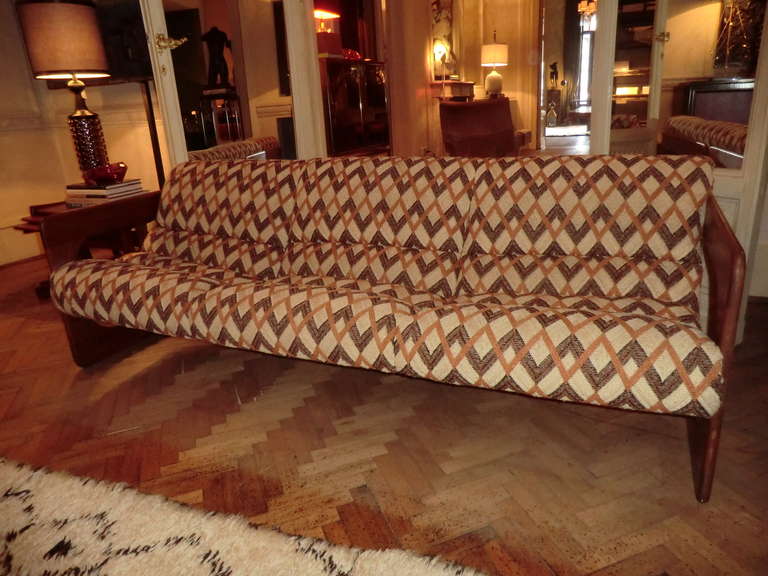 Large cantilevered oak sofa with the original woven fabric from Lou Hodges