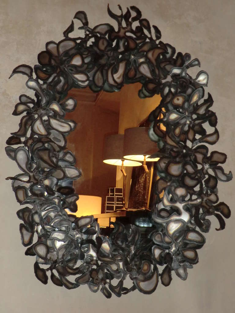 Unique customized steel brutalist mirror in the style of Curtis Jere