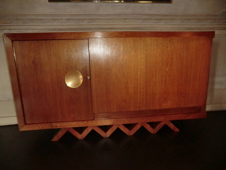 Oak bar cabinet ,  original brass details, oak shelf in one side , new smoked glass shelf in the other side