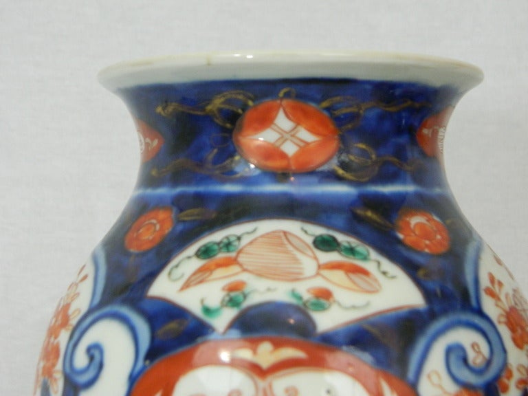 Porcelain Pair of Imari Vases Depicting Floral Decorations on Stands, Early 20th Century For Sale