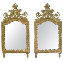 Antique Pair of Neoclassical Cast Bronze Mirrors with a Foliate Urn Centered by Cherubs