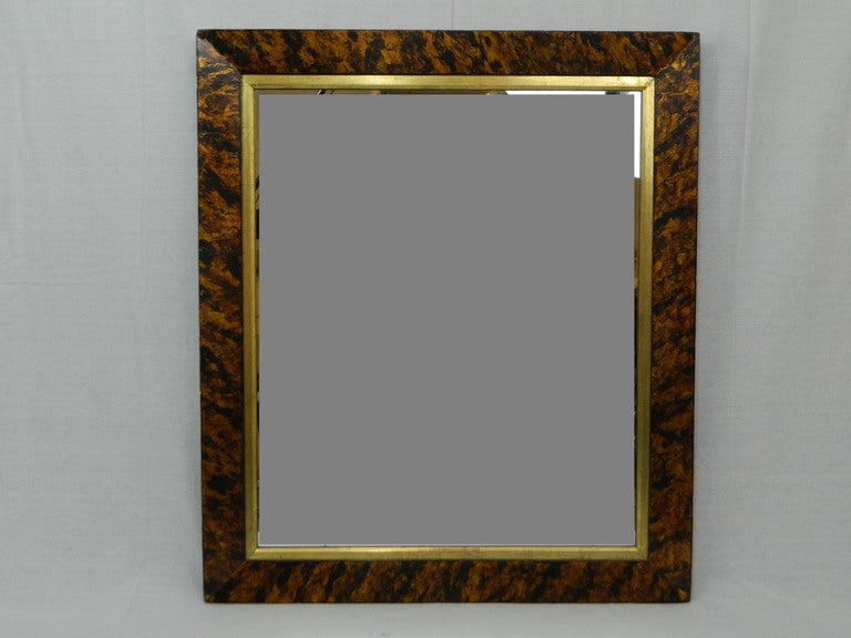 Faux Tortoise Shell Finished Mirror Frame with a Gold Leaf Sight Trim.  Mirror Plate is Antique and can be used vertically or horizontally, 20th Century
