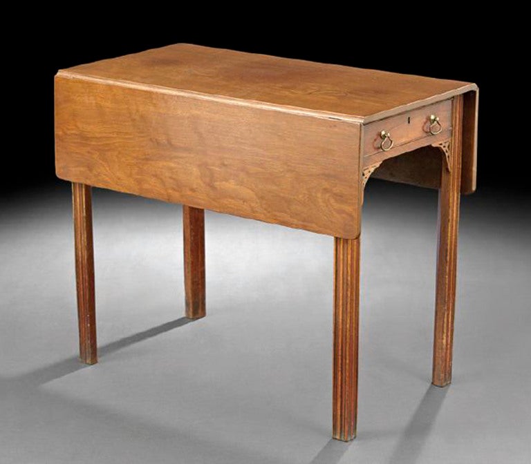 19th century George III style mahogany Pembroke table, the rectangular top with a two like-leaves, above a frieze fitted with a single drawer, raised on chamfered square legs.