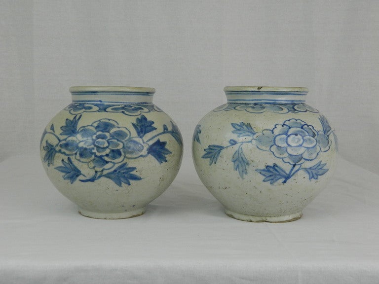Early 19th century pair of Korean lee dynasty blue and white honey jars or bowls (SSAN-HAN-A-RI). These bowls were made for wealthy or high rank noble and were used as a honey bowl for the full of vitality green. Letter of Antique Certification is
