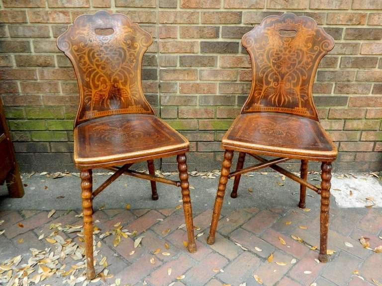 19th century pair of English decorative side hall chairs.