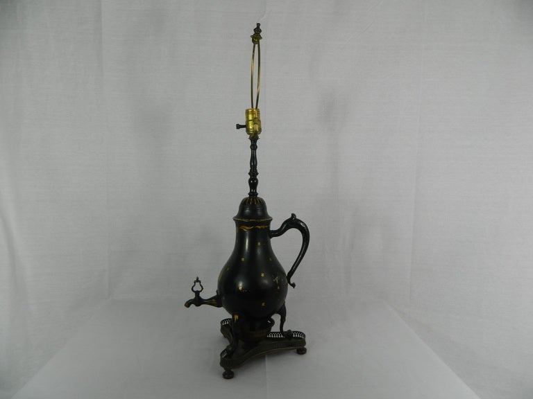 19th century Chinoiserie decorated tole urn mounted as a lamp.