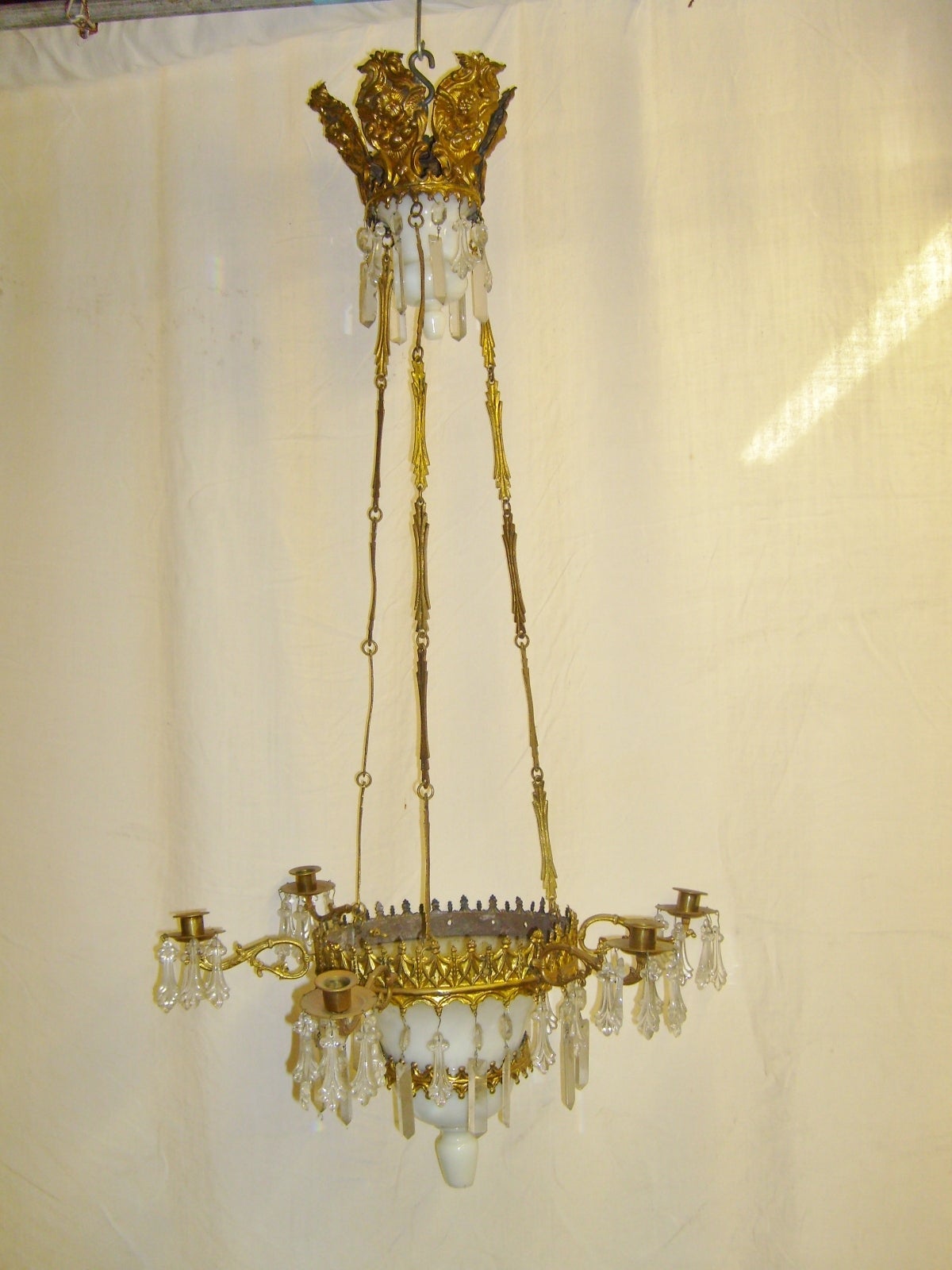 19th century French six-light chandelier with opaline glass and brass.