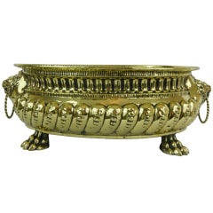 Extra Large and Rare Brass Jardiniere Adorned with Lion Head Handles