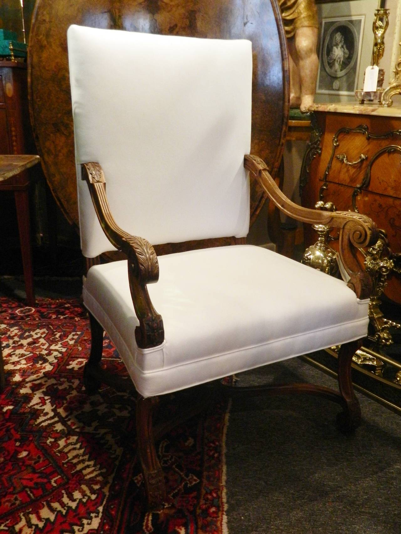 19th century French Provincial carved walnut armchair.