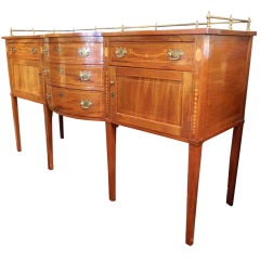 20th Century Sheraton Style Bow Front Mahogany Sideboard with Brass Gallery