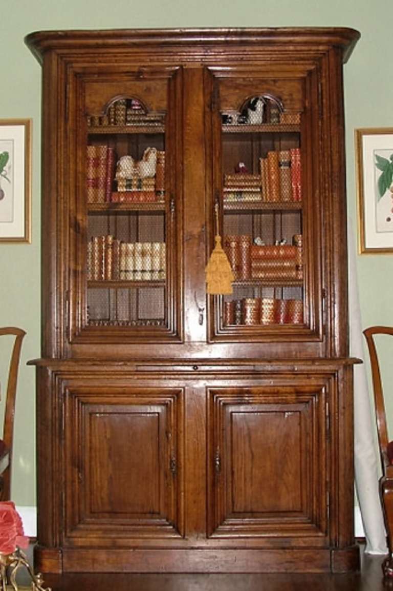 French Provincial Louis Philippe oak Bibliotheque or stepped back buffet with aviary doors, circa 1850.
 