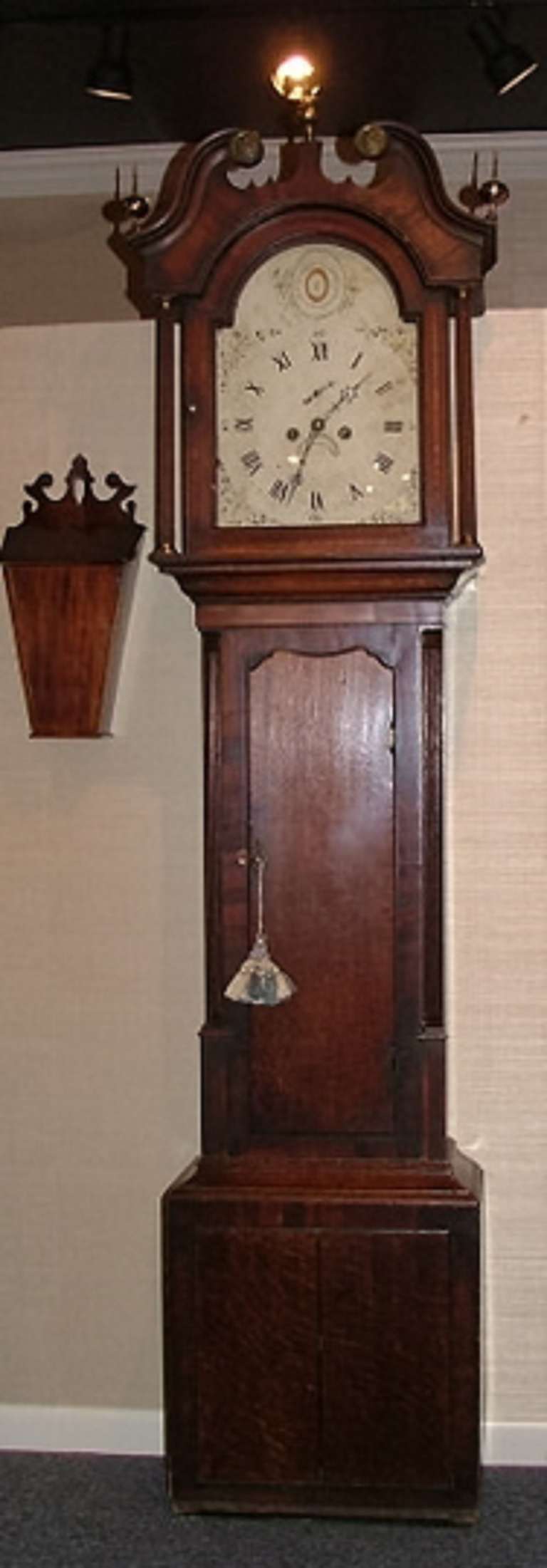 Circa 1780 English Long Case Clock.  Walnut Case with Oak Panels (Door and Base).  Painted steel Face
