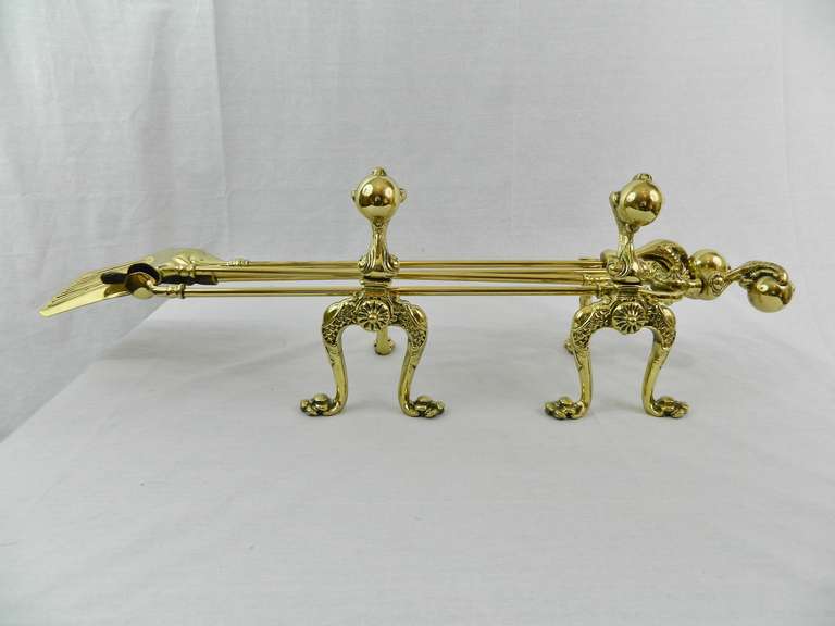 19th Century Brass Fire and Dog Irons or Fire Tools.  Professionally cleaned and polished.
Base is 10
