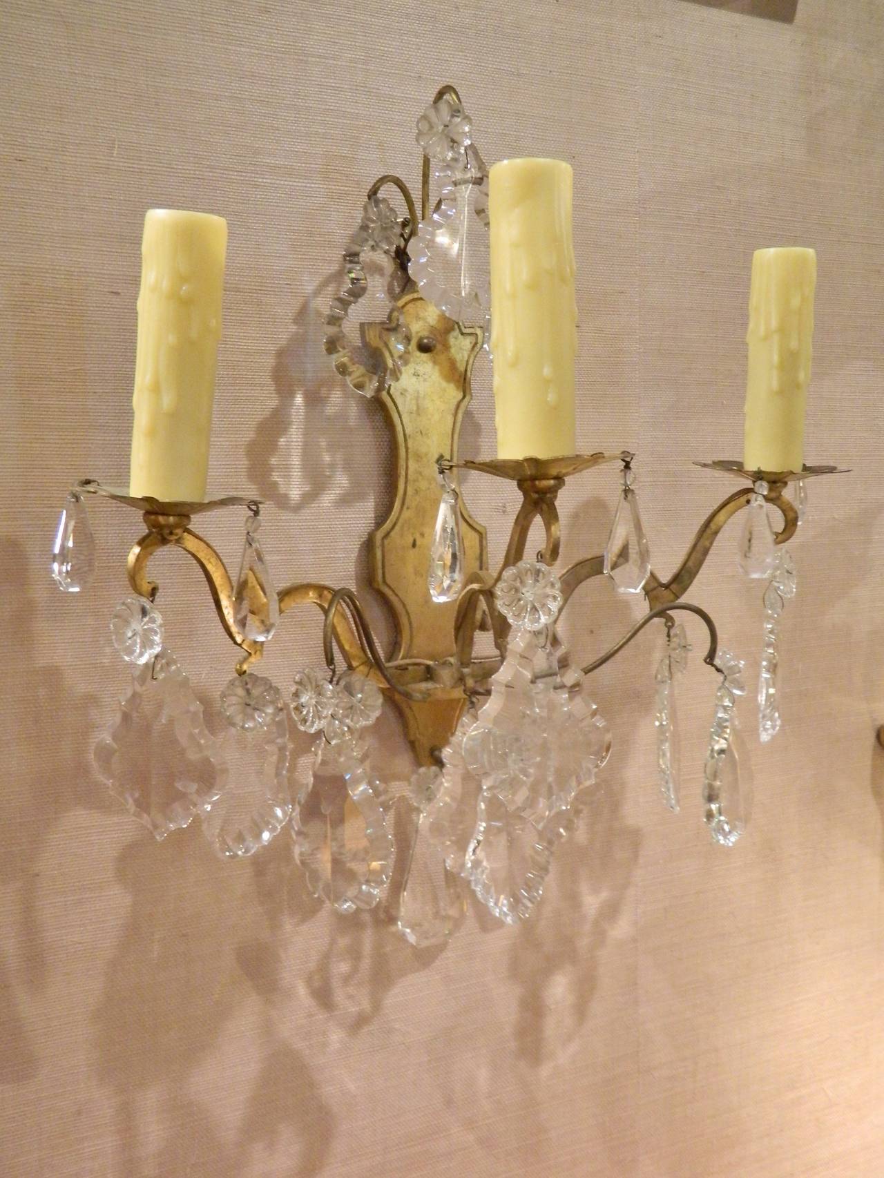 19th Century Set of Four Louis XVI Style Three Light Glass and Brass Wall Sconces