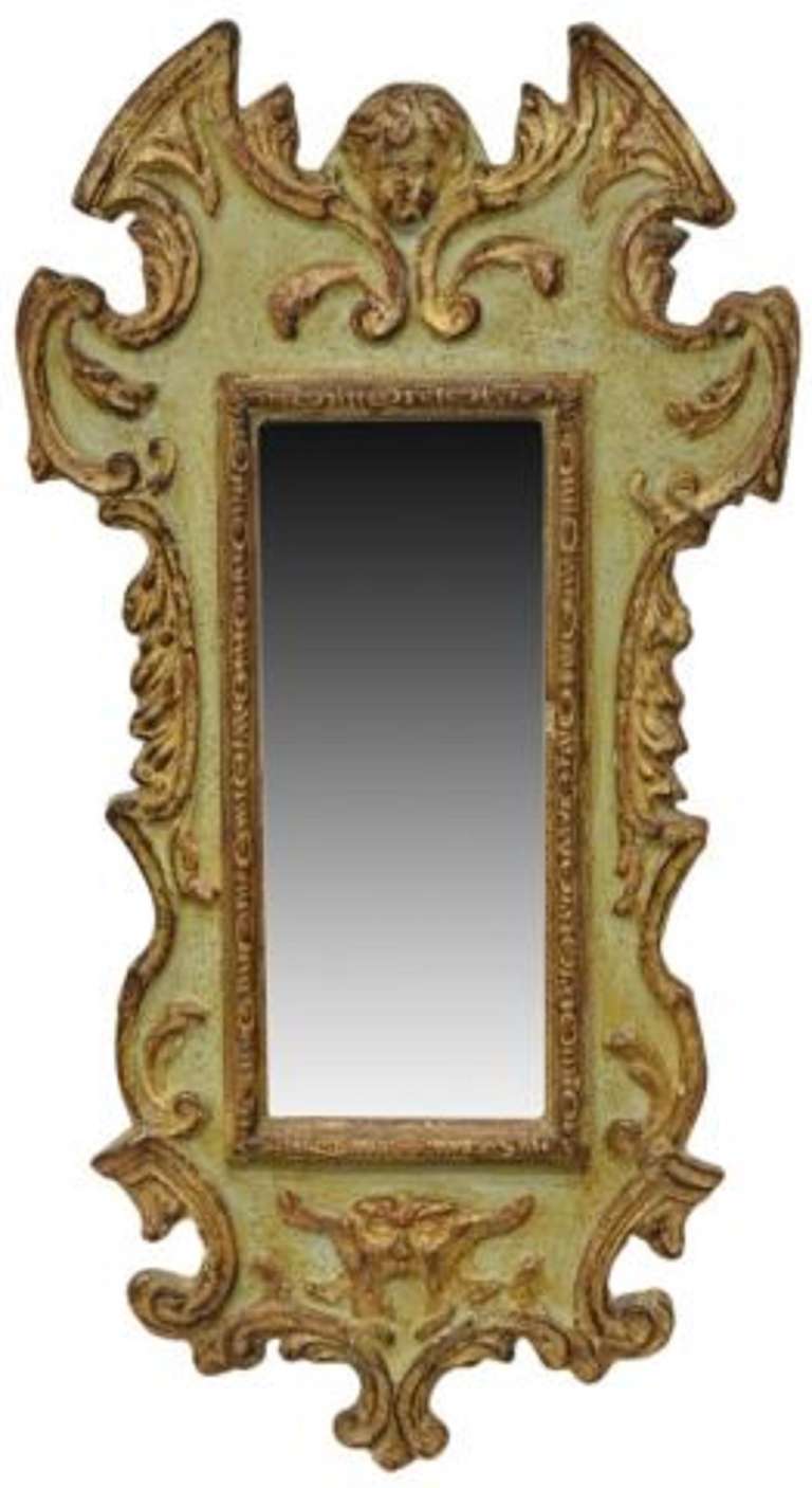 Early 19th Century Hand Carved Italian Parcel Gilt and Painted Mirror, carved foliate and scrolled framing around the rectangular mirror