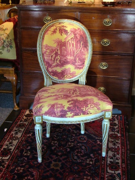 Pair of Louis XVI Style Painted Chairs from the workshop of the world reknowned New York Designer Sister Parrish.  Original Sister Parrish Fabric.  Circa 1950s