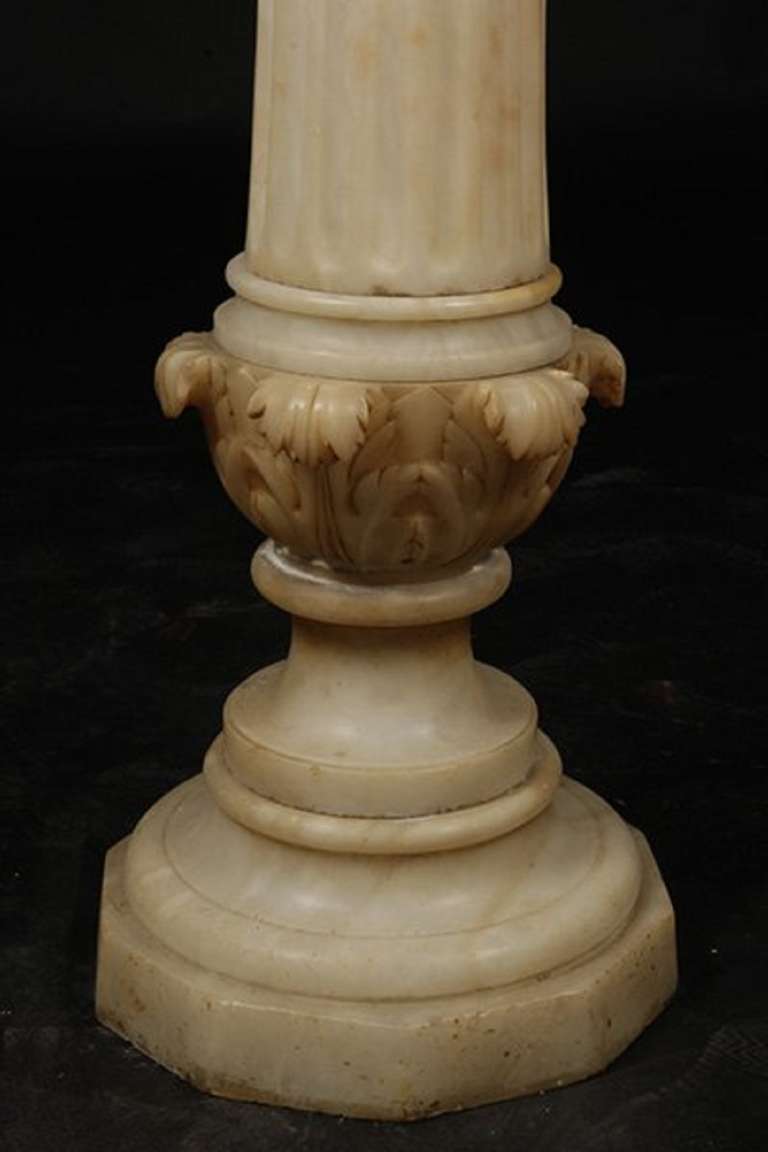 Circa 1900's Carved Alabaster Bust of Diana Resting on Alabaster Pedestal In Excellent Condition In Savannah, GA