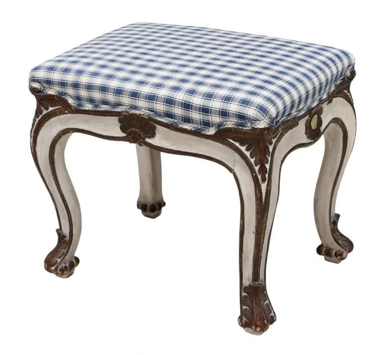 Late 19th Century Louis XV Style Parcel Gilt Painted Bench or Footstool with later blue and white checked upholstery, parcel gilt painted frame, rising on cabriole legs