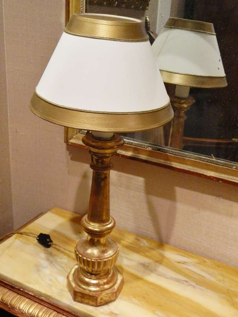 19th century pair of gold gilded Italian prickets adapted as lamps using bees wax sleeves and hand-painted shades.  Prickets are 12