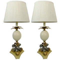 Pair of Gilt Metal Neoclassical Lamps Centered with an Ostrich Egg and Dolphins