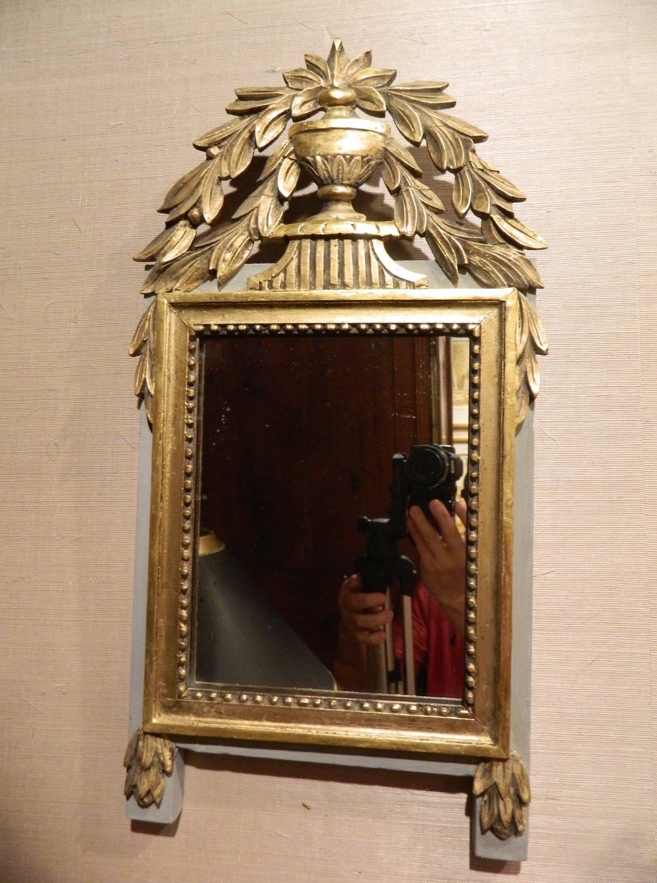 French Louis XVI Style Gilded and Painted carved and crested wood mirror, beading, 19th Century