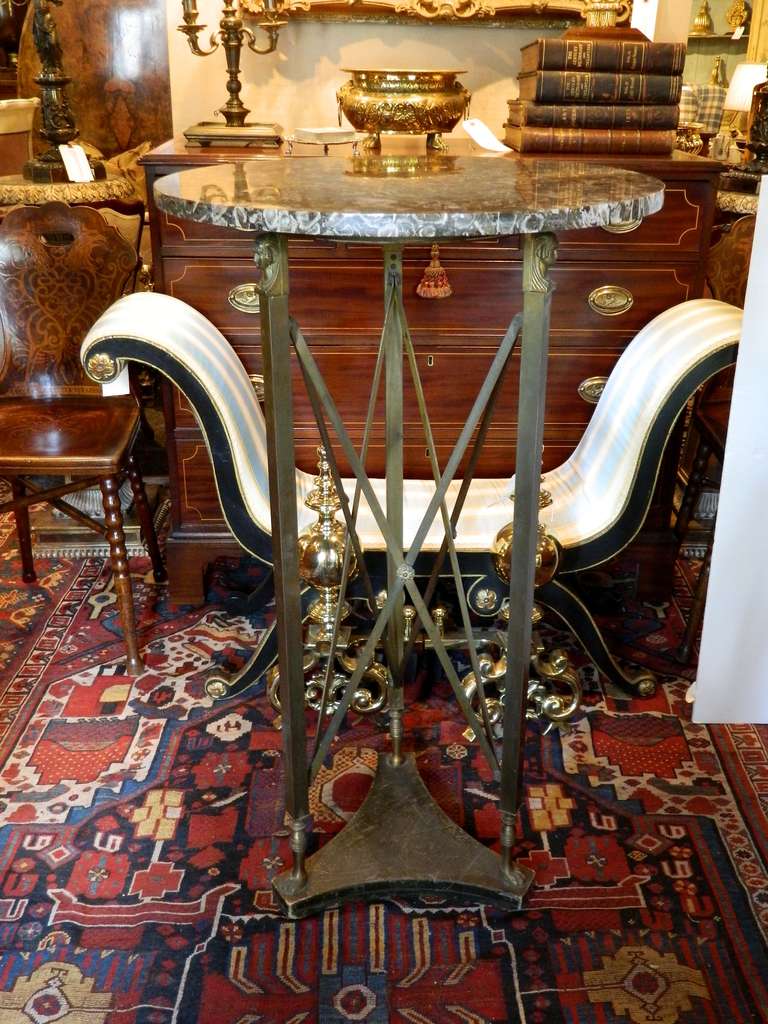 Early 20th Century Empire Style Bronze Marble Top Figural Stand or Pedestal Table Having X Form Supports Resting on Conforming Wood Stand