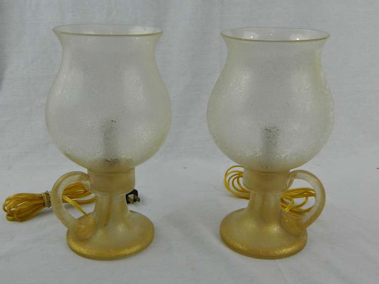 Pair of Circa 1940's Murano Glass Candle Holder Style Lamps with Globes and Gold Inclusions