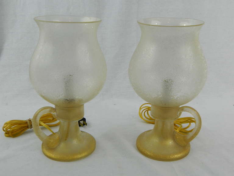 brass candle holders with glass globe