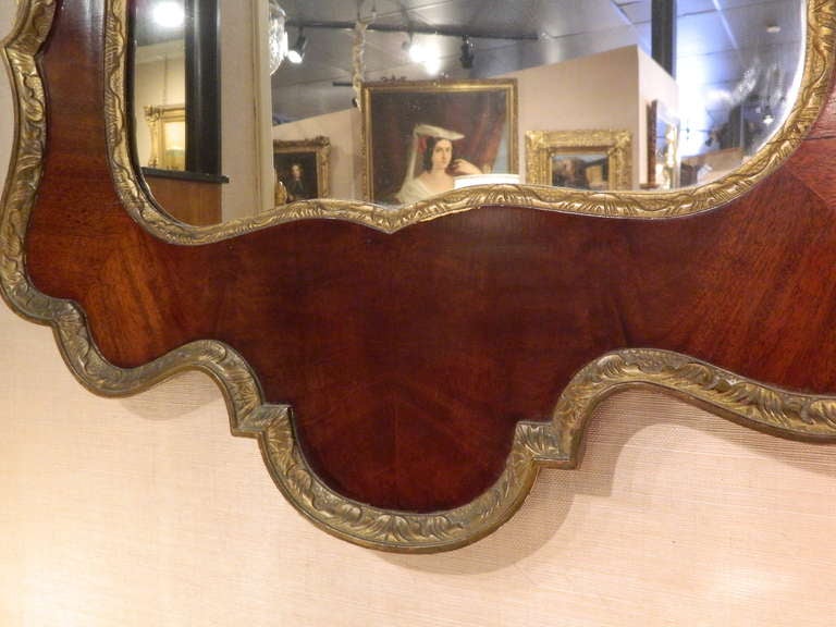 19th Century George II-Style Mahogany and Parcel Gilt Mirror with a Gilt Phoenix Finial