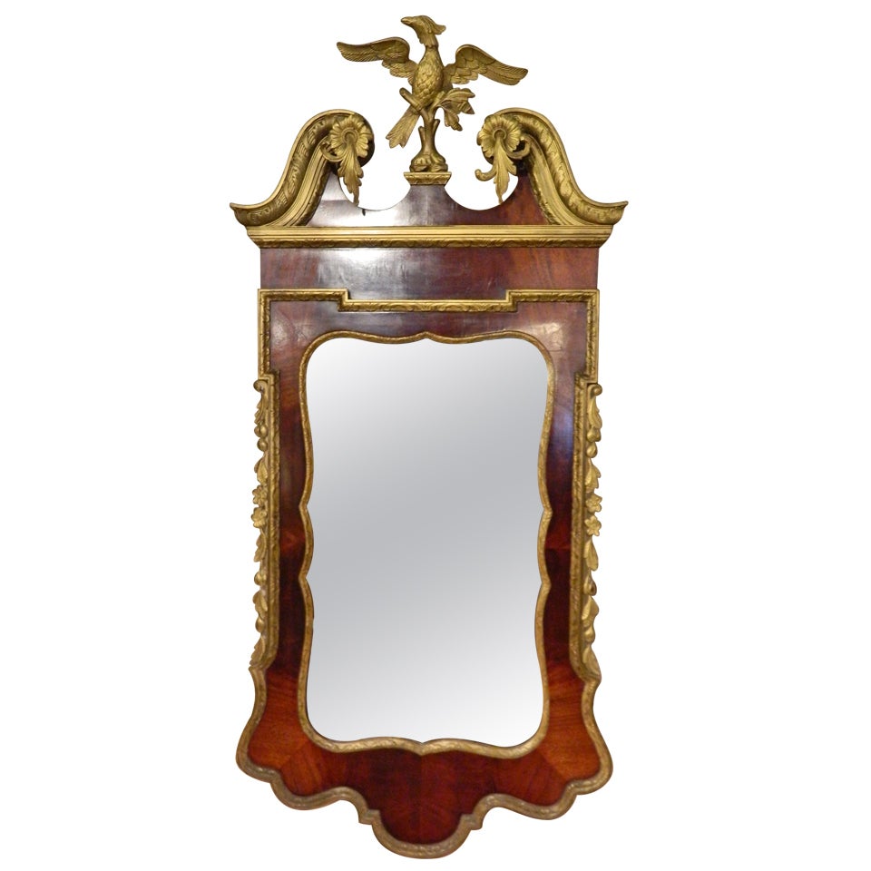 George II-Style Mahogany and Parcel Gilt Mirror with a Gilt Phoenix Finial