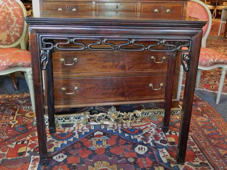 Mid-19th century rosewood Chinese altar table embellished with pierced scrolled fretwork.