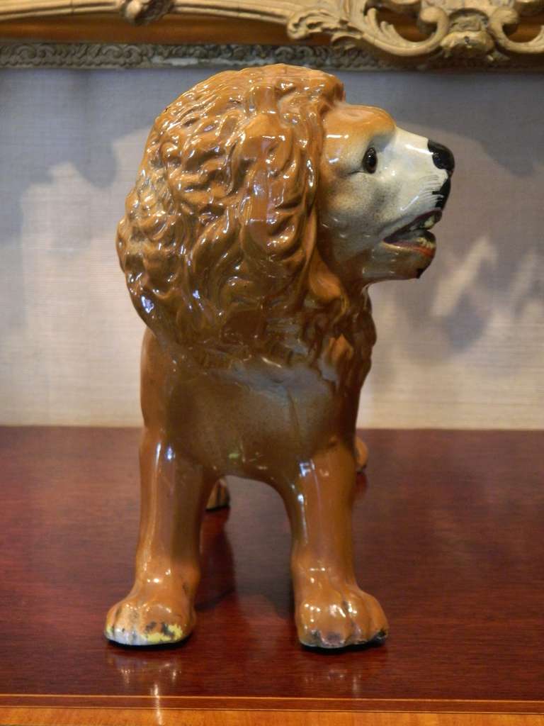 English Pair of Late 19th Century Staffordshire Opposing Lions with Glass Eyes