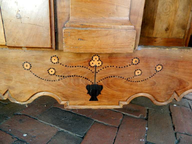 18th Century and Earlier 18th Century Louis XV Fruitwood Armoire with Stars and Flower Inlay