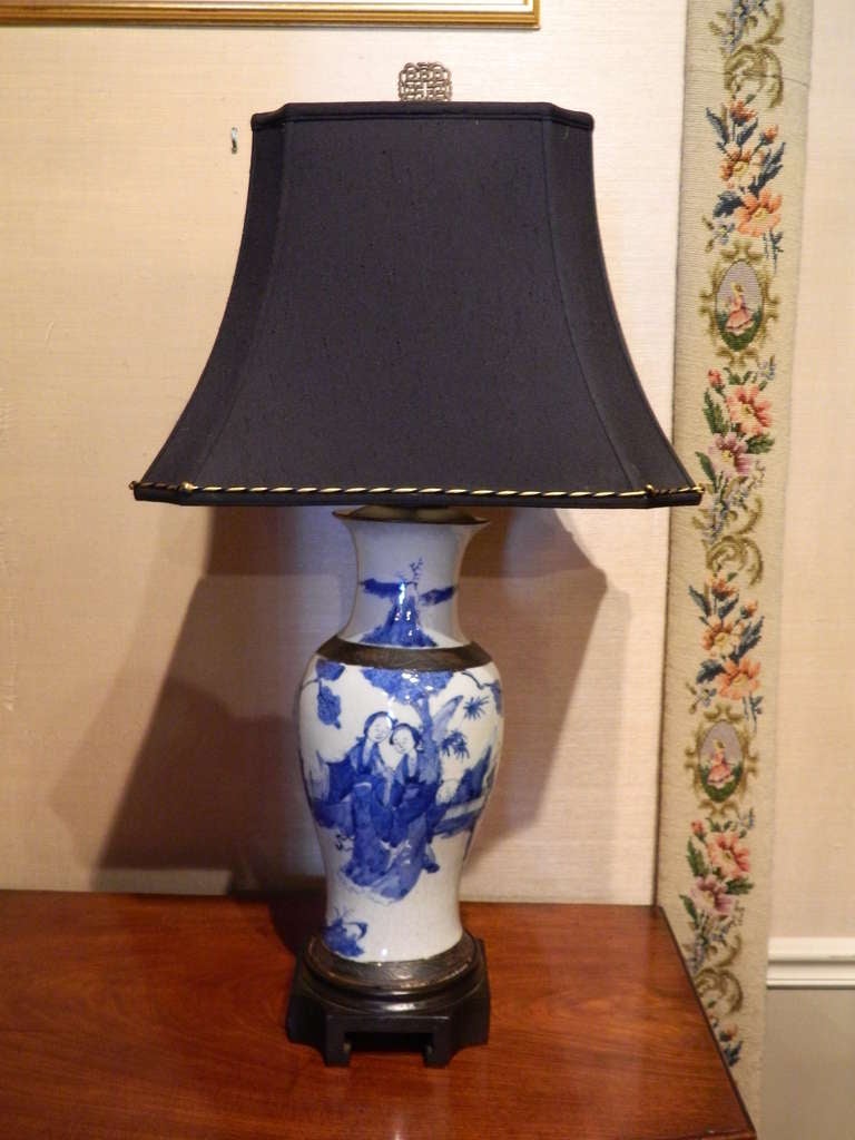19th Century Blue and White Baluster Form Vase Adapted as a Lamp with a Linen black shade with gold trim on a Rosewood Base